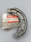Preview: Yamaha SUZUKI BREMSBELAG GS400C GS450 BRAKE, SHOE XX36349 64410-11300-000 Original Ersatzteil – MG-Teileshop