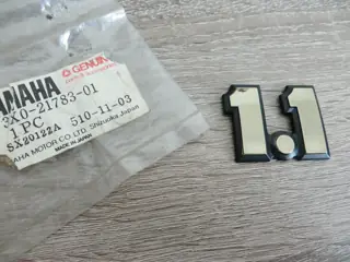Yamaha Seitendeckel Emblem XS1100 side cover emblem Original NOS