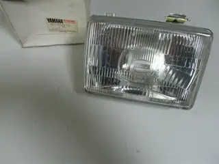 Yamaha Scheinwerfer XS400 12E, XJ600, XJ750, XJ900F, XT600Z, XTZ750, XZ550 Headlight Lens 11U-84321-G0 - Original Neu - MG-Teileshop