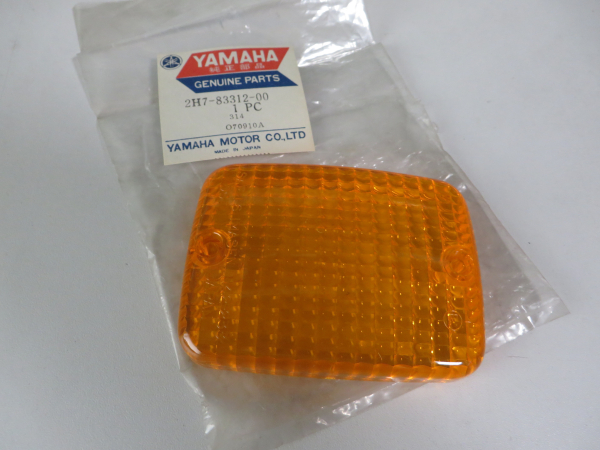 Yamaha XS1100 front flasher lens 2H7-83312-00 Original NEU 2H7-83312-00 Genuine spare part – MG-Teileshop